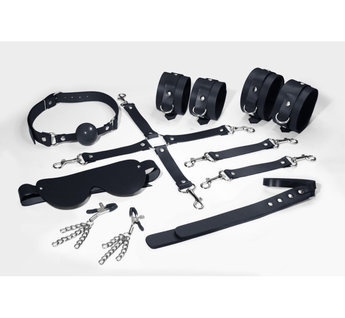Набор Feral Feelings BDSM Kit 7 Black, наручники, поножи, коннектор, маска, паддл, кляп, зажимы