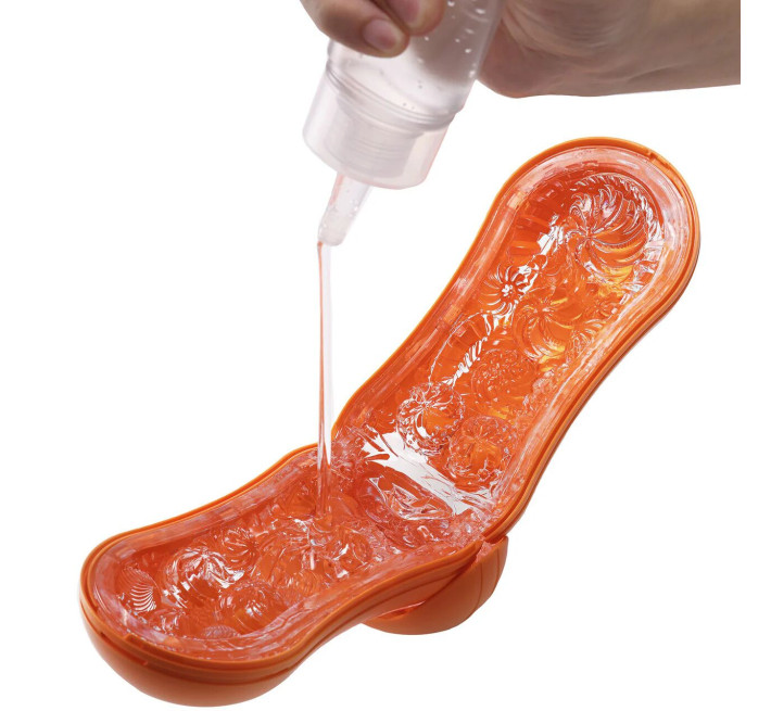 Мастурбатор Tenga Flip Orb — Sunset Orange, з можливістю зміни тиску та стимулювальними кульками всередині