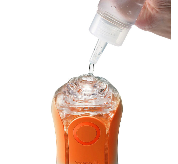 Мастурбатор Tenga Flip Orb — Sunset Orange, з можливістю зміни тиску та стимулювальними кульками всередині